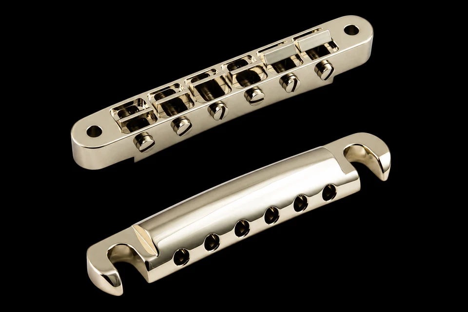 ABM 2500 Tune-o-matic bridge and ABM 3020 stop tailpiece on a black background